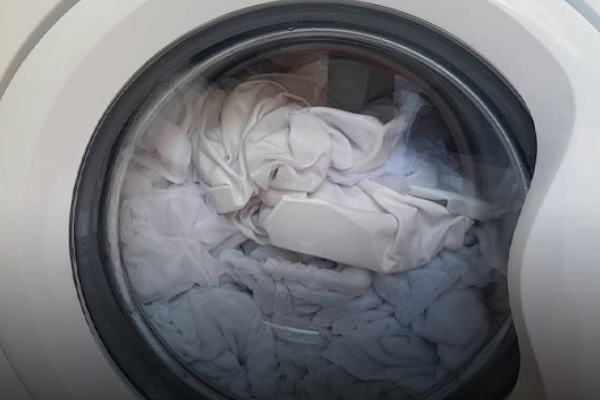 راهنمای شستن پرده حریر در خانه با لباسشویی و دست